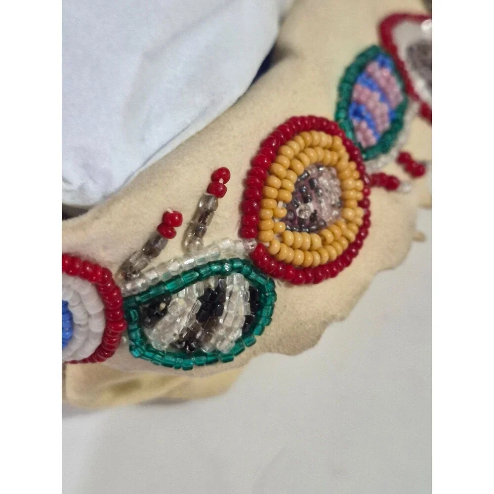 Vintage Crow Beaded Hide Moccasins featuring Intricate Colorful Glass Beadwork